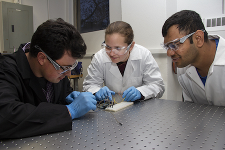 Professor Bergbreiter in the lab with students.