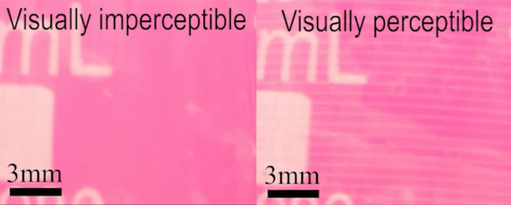 The sensor on the camera lens appear completely clear on the left side, but has visible stripes on the right side. 
