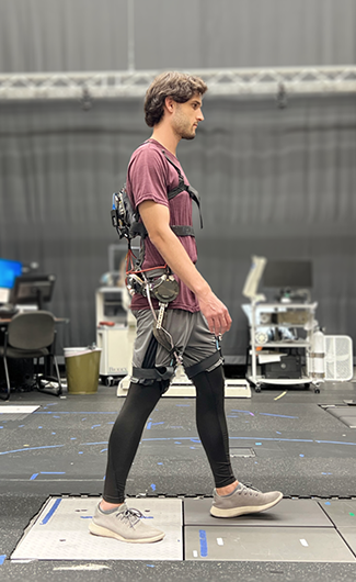 human wearing robotic exoskeleton